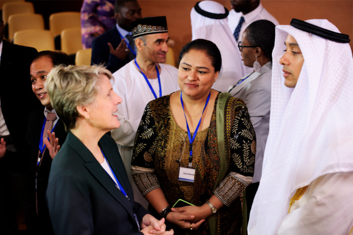 Foreign policy officers talking with Arab diplomats